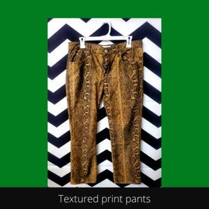 animal print textured corduroy pants